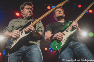 Little River Band guitarists Rich Herrings and Colin Whinnery playing live together at Ameristar Casino's Star Pavilion in Kansas City, MO on January 15, 2022.