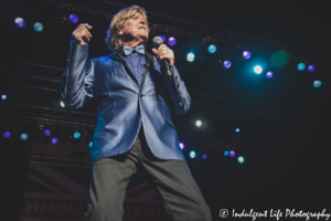 Peter Noone singing and jiving live in concert with his group Herman's Hermits at Ameristar Casino's Star Pavilion in Kansas City, MO on January 28, 2022.