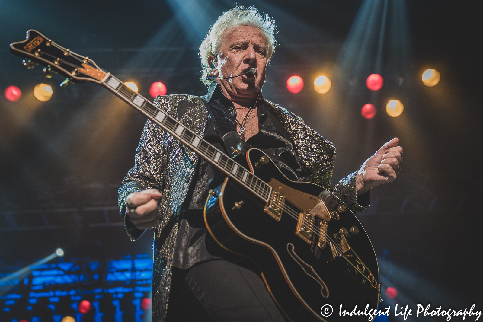 Air Supply's Graham Russell singing and playing the guitar at Star Pavilion inside of Ameristar Casino in Kansas City, MO on May 7, 2022.