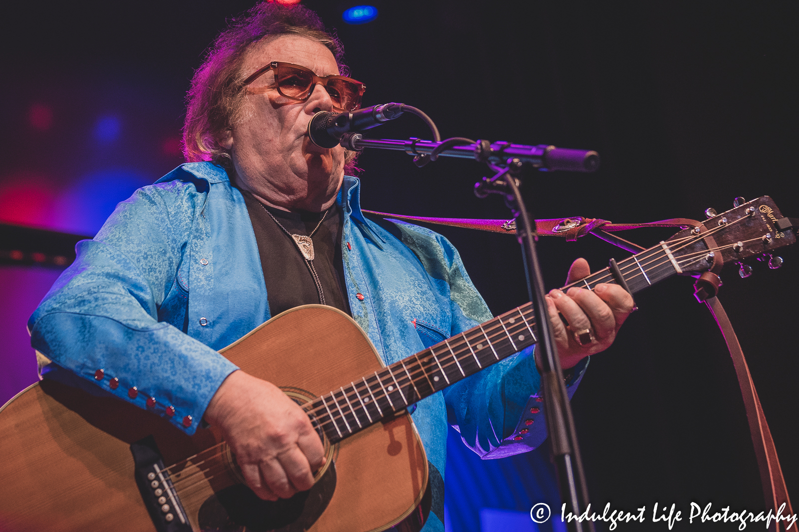 Don McLean singing during his concert at Uptown Theater in Kansas City, MO on April 29, 2022.