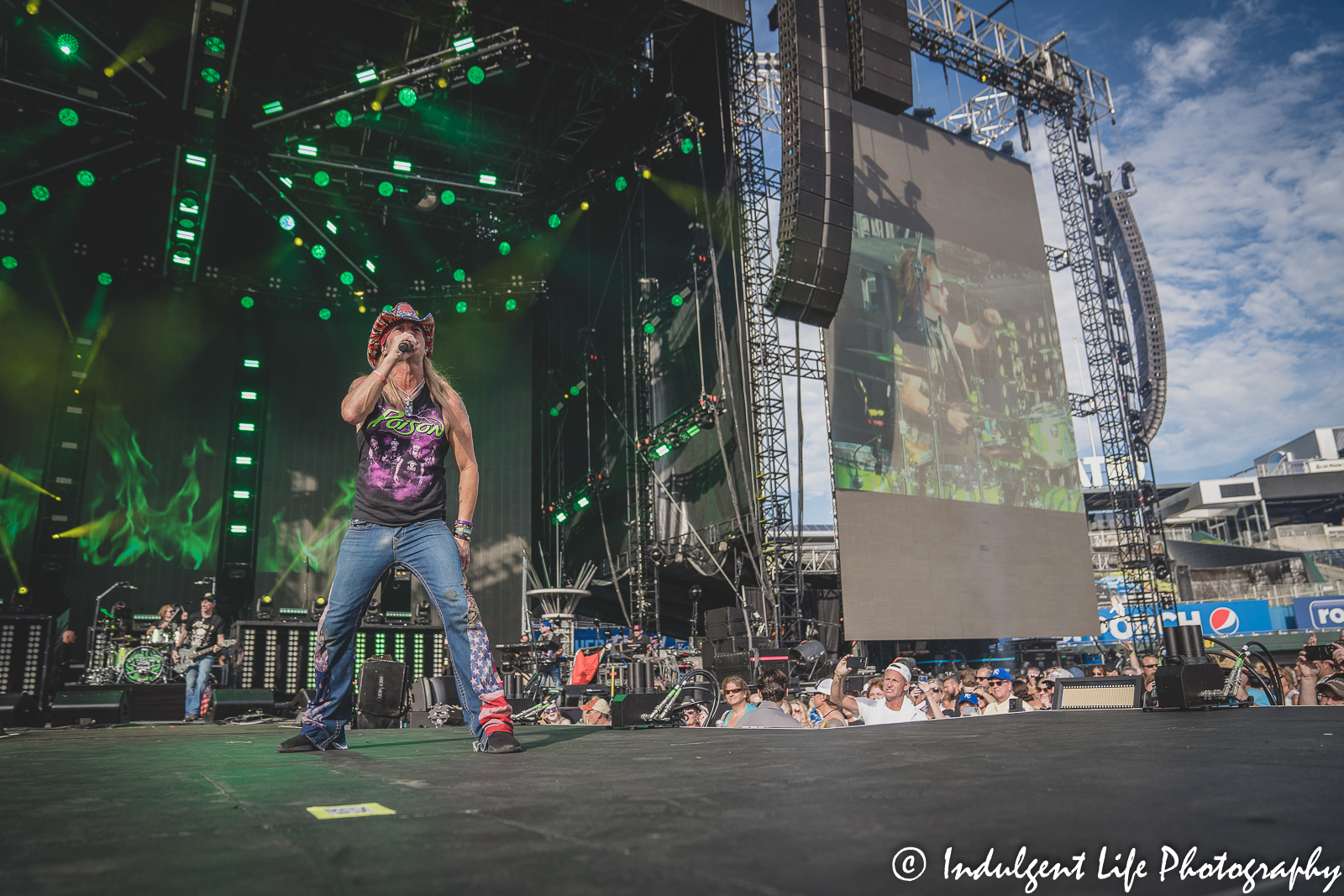 Bret Michaels singing live during his performance with Poison at Kauffman Stadium in Kansas City, MO on July 19, 2022.