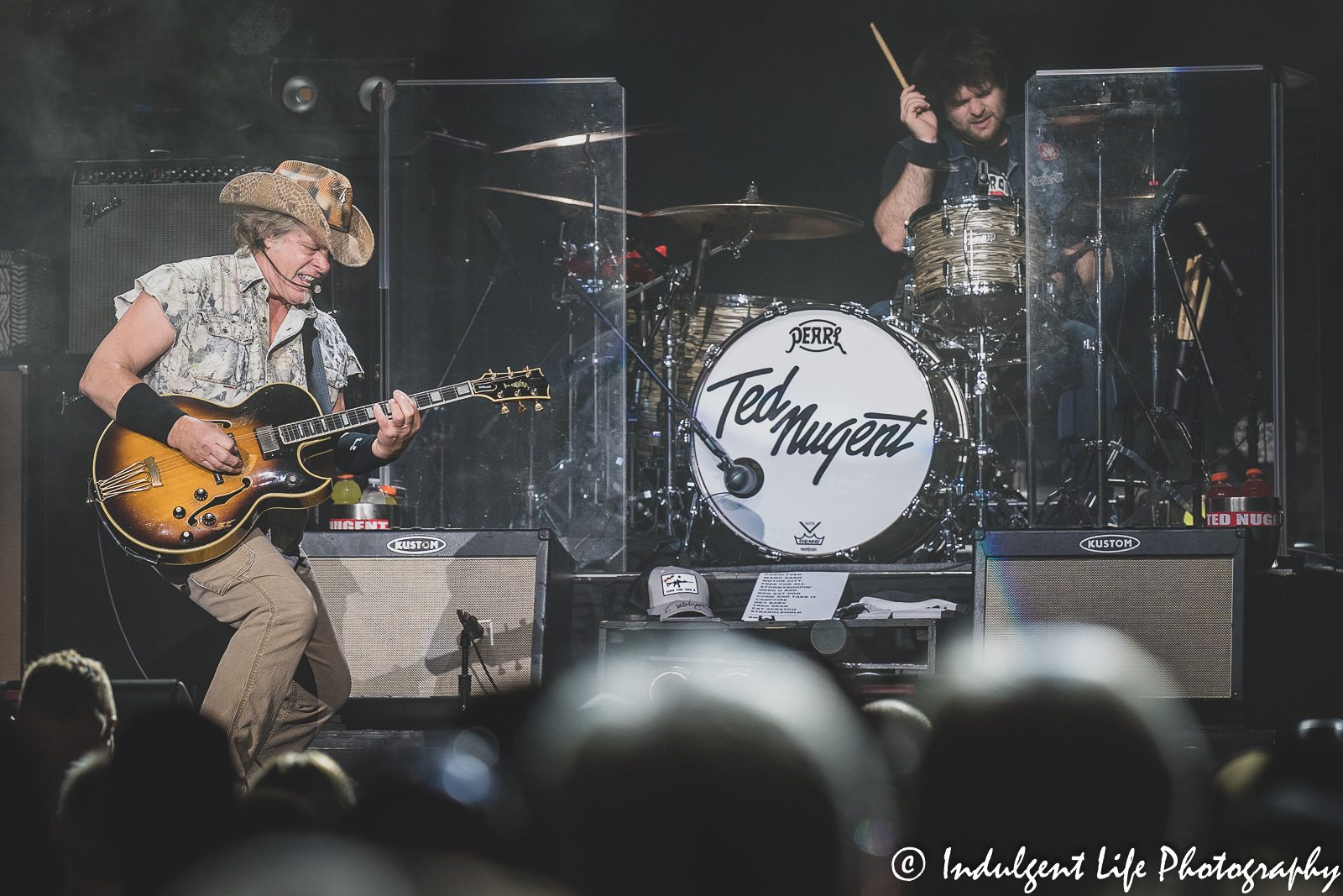 Ted Nugent and drummer Jason Hartless performing together at Ameristar Casino Hotel Kansas City on August 6, 2022.