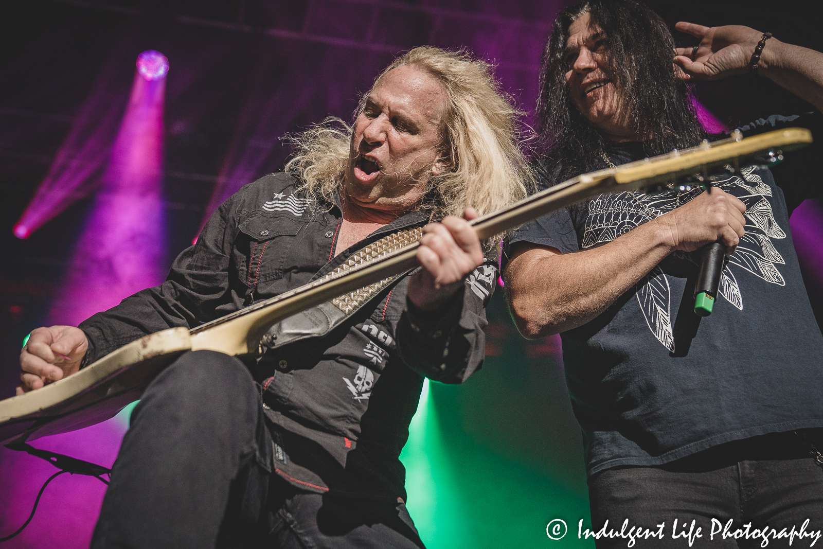 Slaughter bandmates Mark Slaughter and Dana Strum performing together at Ameristar Casino Hotel Kansas City on October 8, 2022.