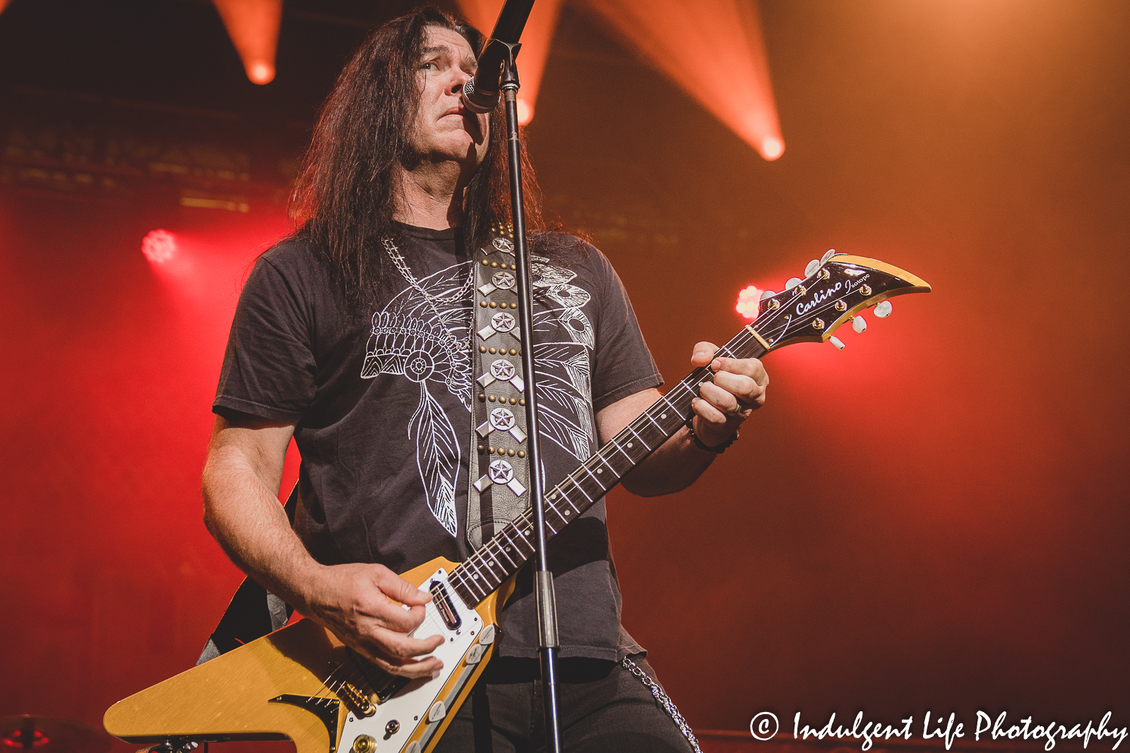 Slaughter band frontman Mark Slaughter playing rhythm guitar at Ameristar Casino in Kansas City, MO on October 8, 2022.