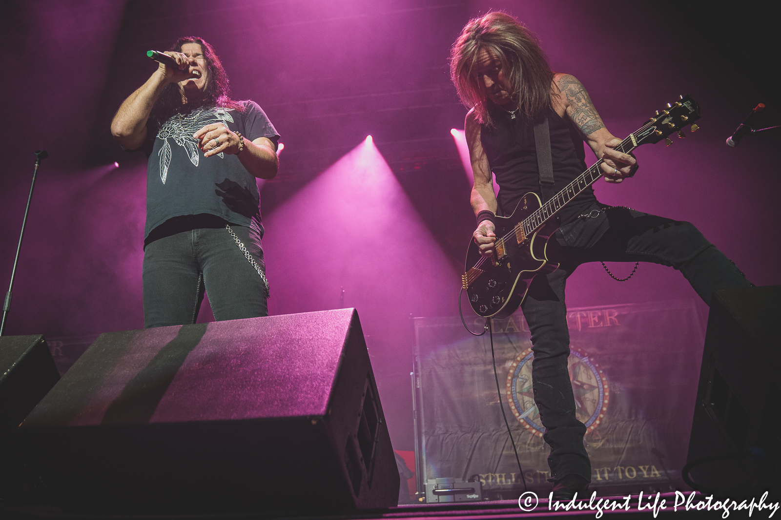 Slaughter band members Mark Slaughter and guitarist Jeff "Blando" Bland playing together at Ameristar Casino in Kansas City, MO on October 2022.