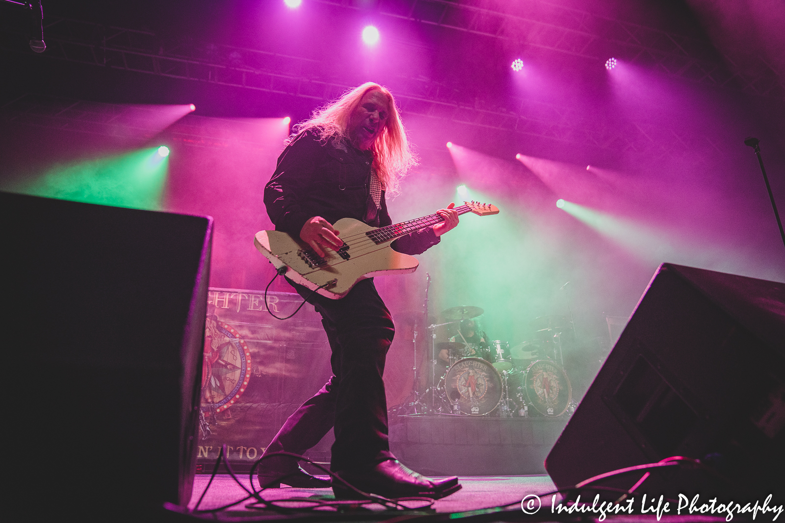 Bass guitar player Dana Strum of Slaughter live in concert at Ameristar Casino's Star Pavilion in Kansas City, MO on October 8, 2022.