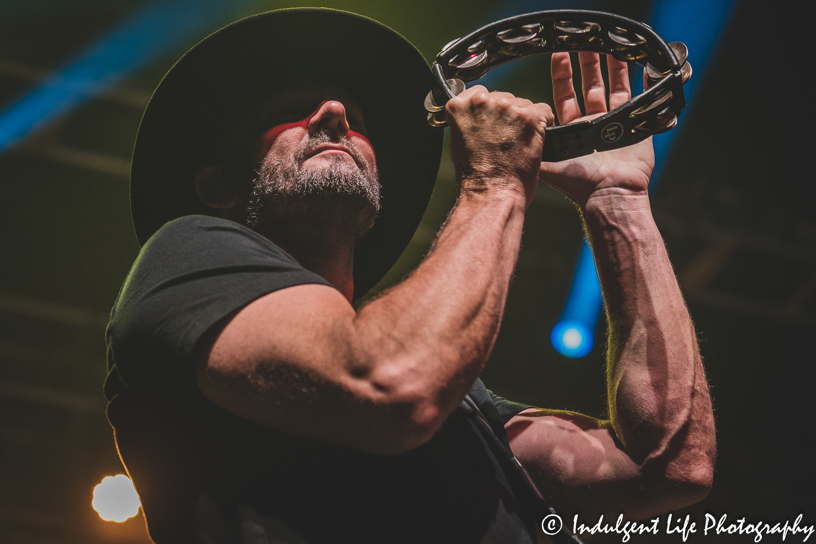 Sister Hazel band member Jett Beres playing the tambourine live at Ameristar Casino Hotel Kansas City on October 21, 2022.