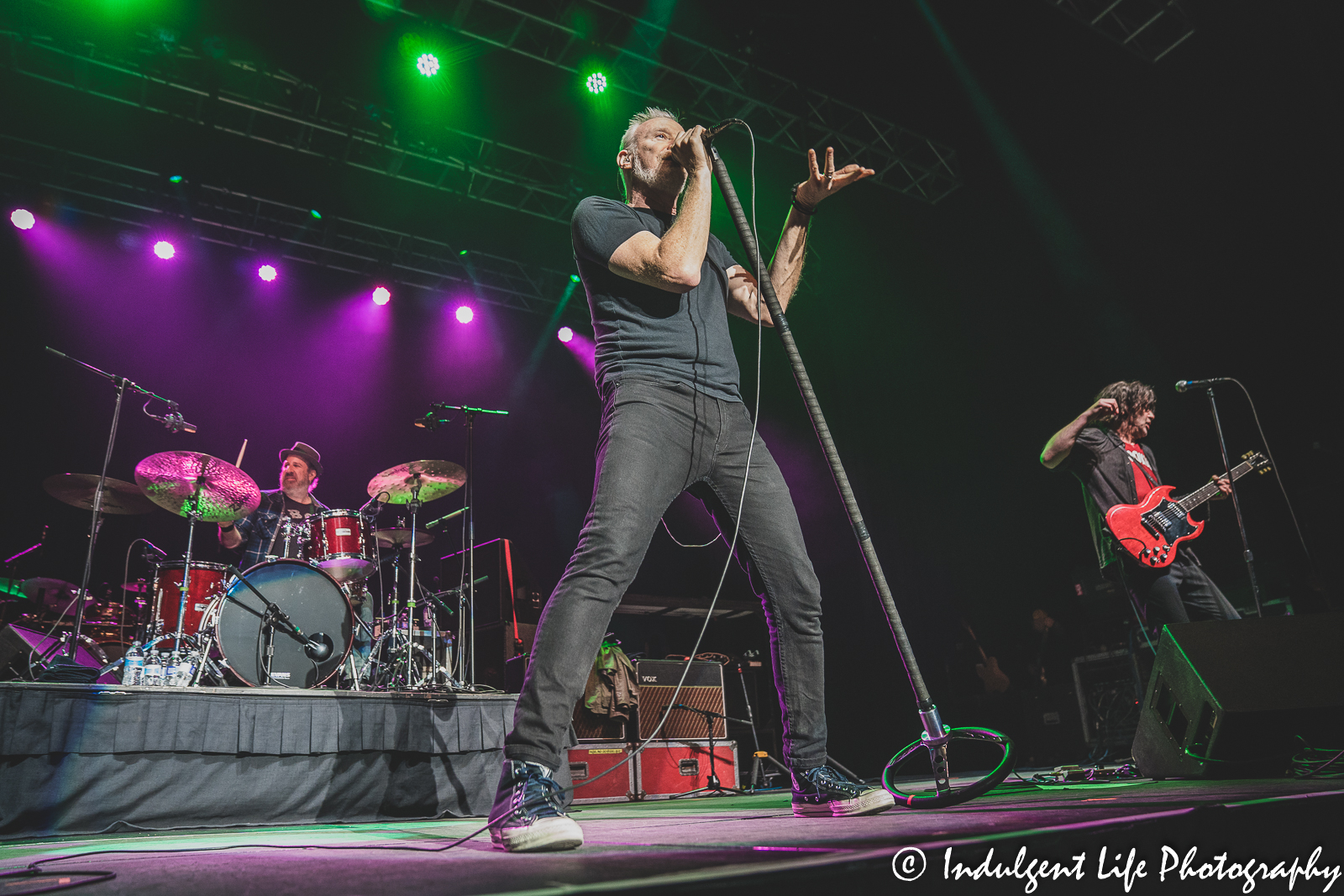 Spin Doctors members Chris Barron, Aaron Comess and Eric Schenkman performing together at Ameristar Casino in Kansas City, MO on October 21, 2022.