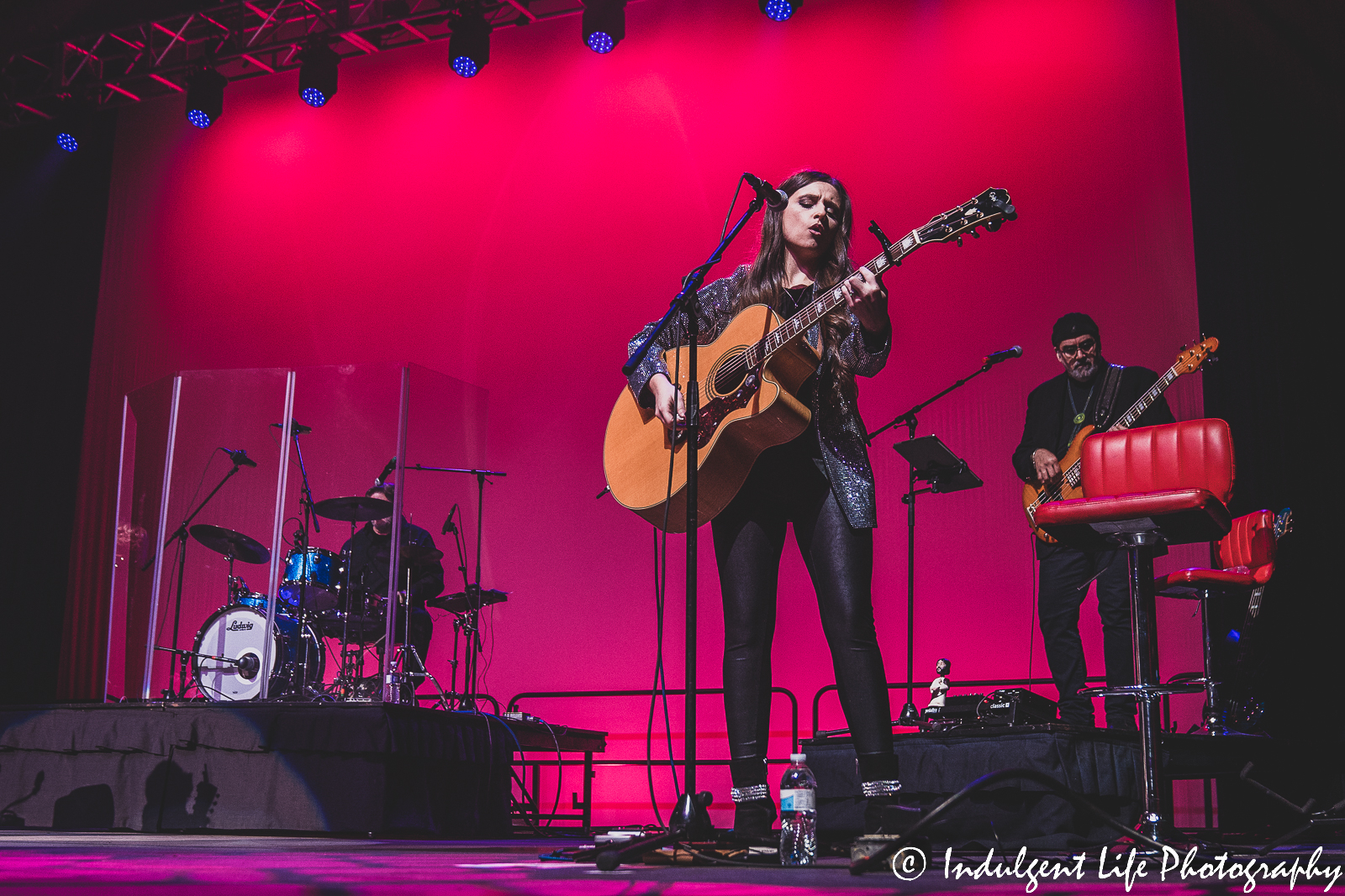 Lorrie Morgan's acoustic guitarist, bass player and drummer performing live at Ameristar Casino in Kansas City, MO on January 21, 2023.