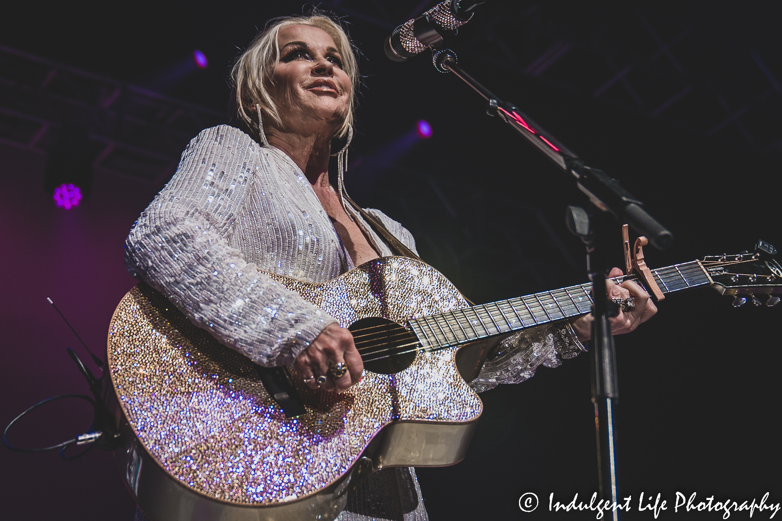 Lorrie Morgan performing with her golden glitter guitar at Ameristar Casino's Star Pavilion in Kansas City, MO on January 21, 2023.