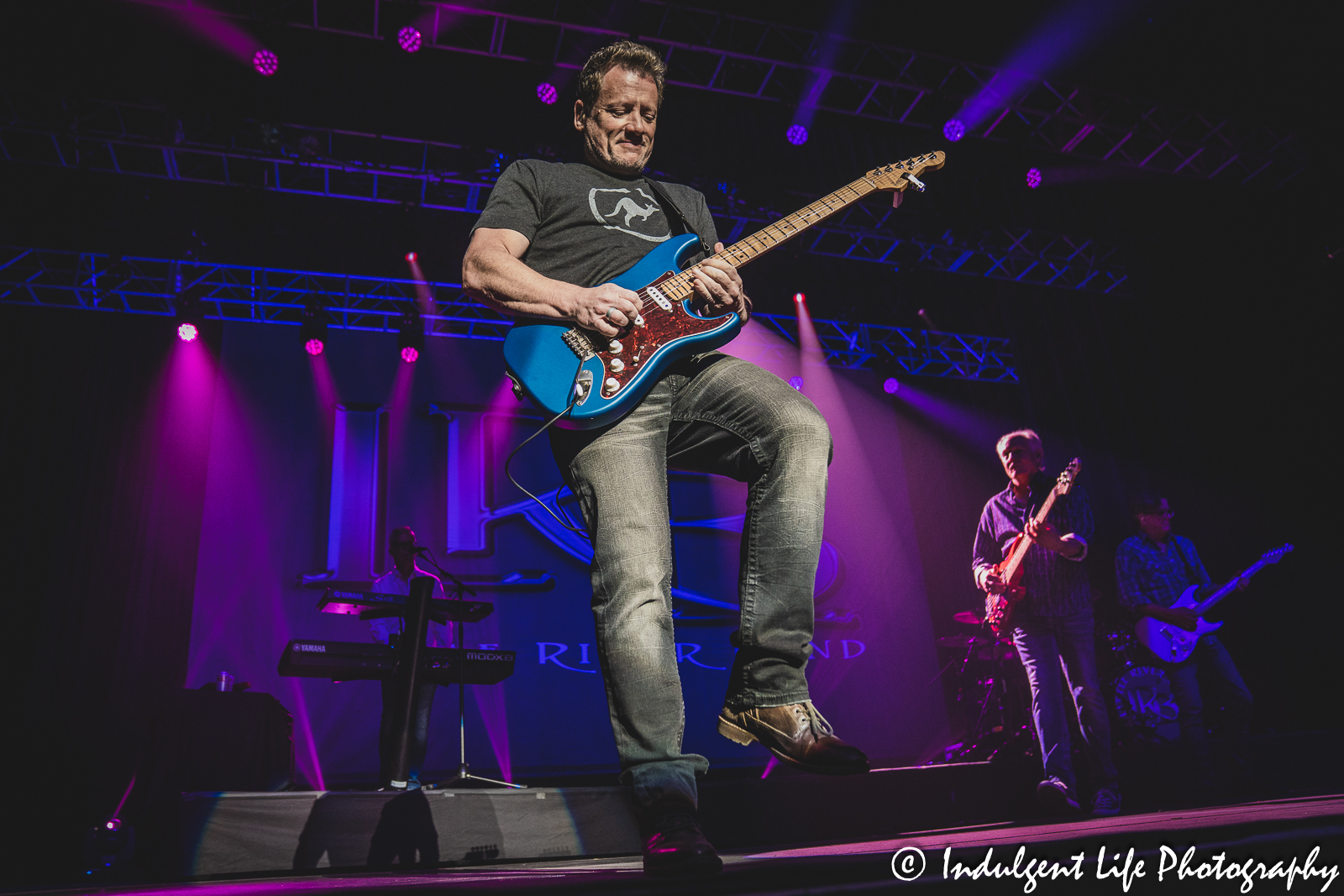 LRB guitarist Colin Whinnery performing with drummer Ryan Ricks and keyboard player Chris Marion at Ameristar Casino in Kansas City, MO on March 25, 2023.