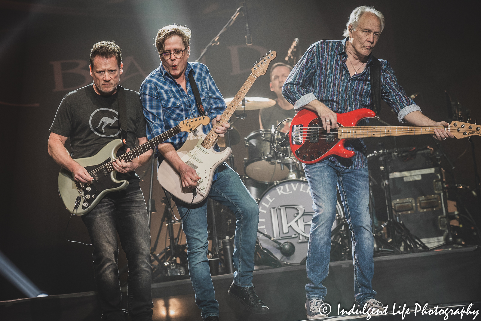 Little River Band lead vocalist and bass player performing with guitarists Colin Whinnery and Bruce Wallace plus drummer Ryan Ricks at Ameristar Casino in Kansas City, MO on March 25, 2023.