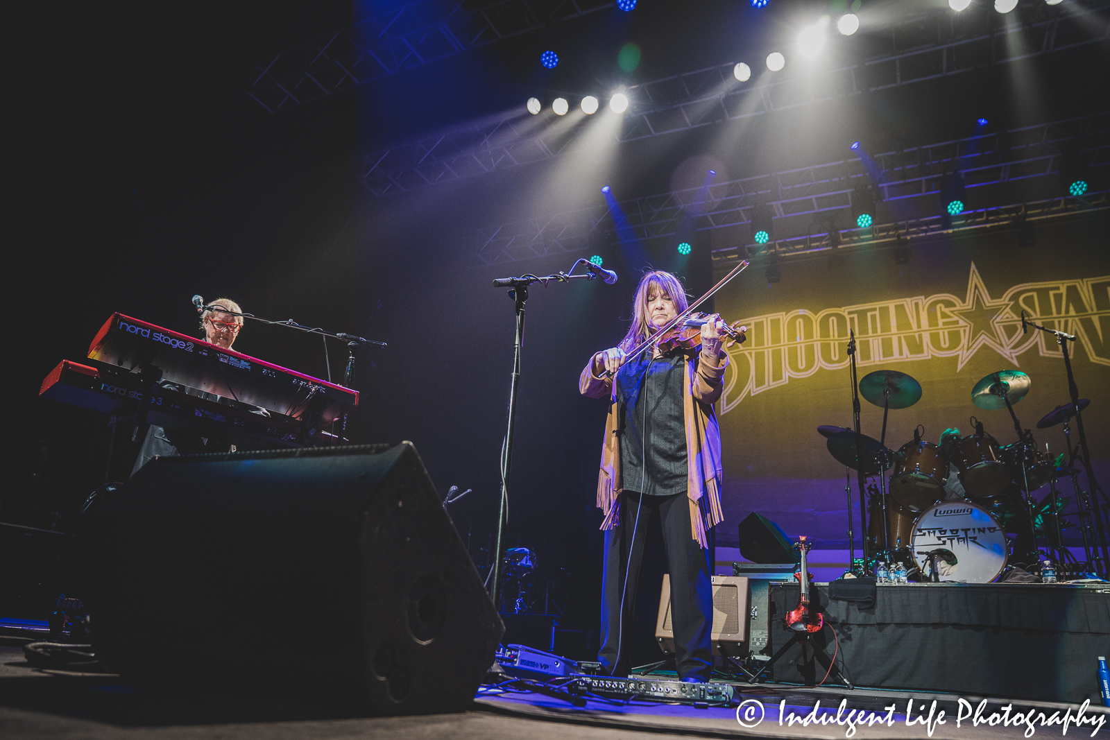 Shooting Star keyboard player Dennis Laffoon, violinist Janet Jameson and drummer Steve Thomas live in concert at Ameristar Casino in Kansas City, MO on March 18, 2023.