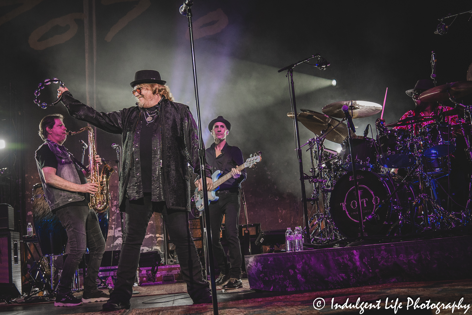 Toto frontman Joseph Williams performing with multi-instrumentalist Warren Ham, bass player John Price and drummer Robert “Sput” Searight at Uptown Theater in Kansas City, MO on March 29, 2023.