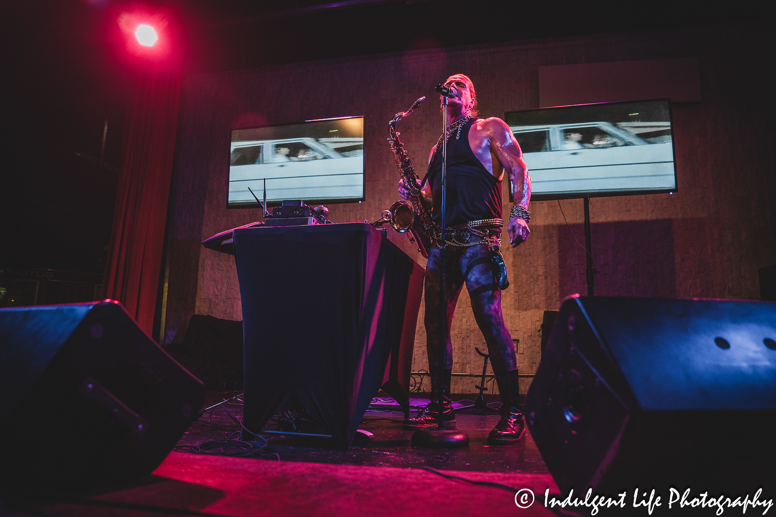 Saxophone player Tim Cappello performing with a "Miami Vice" clip at the recordBar in downtown Kansas City, MO on June 15, 2023.