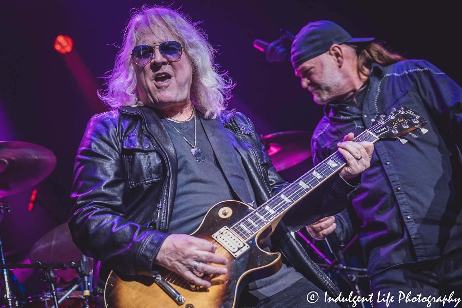 Guitarist Rusty Crewse and lead singer Frank Drummond in concert together at Ameristar Casino Hotel Kansas City on April 20, 2024.