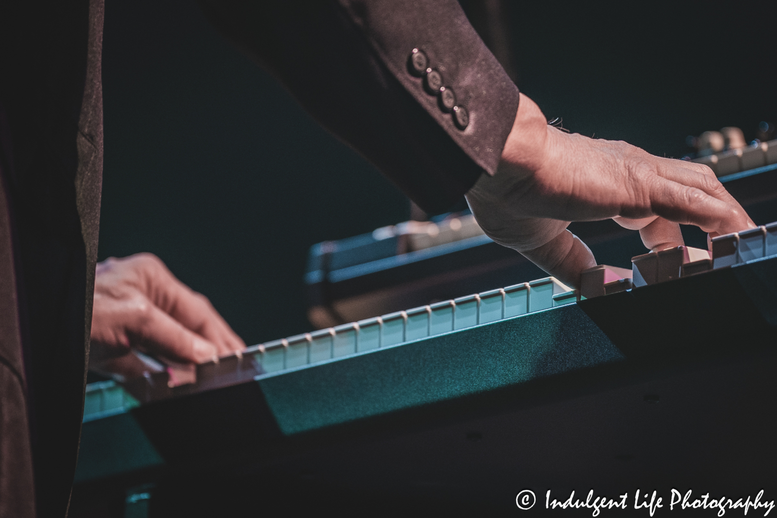 Hands of Shooting Star keyboardist Dennis Laffoon as he performs live at Ameristar Casino Hotel Kansas City on April 20, 2024.