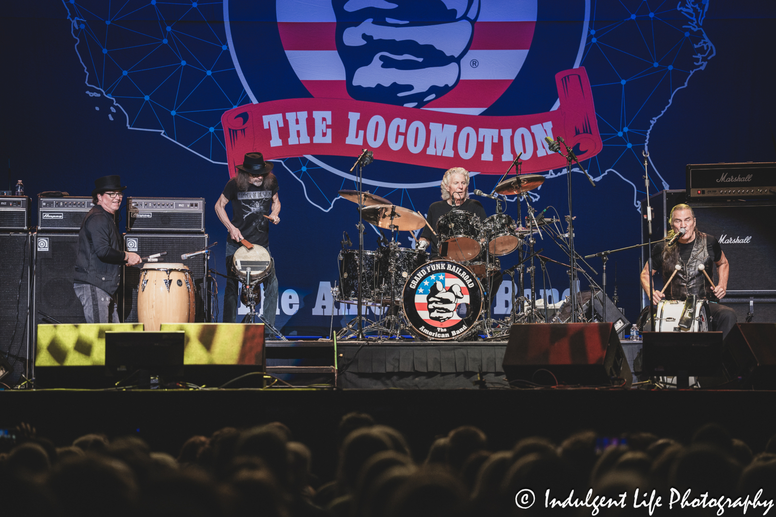 Grand Funk Railroad in a performing in a percussion circle at Ameristar Casino's Star Pavilion at June 21, 2024.