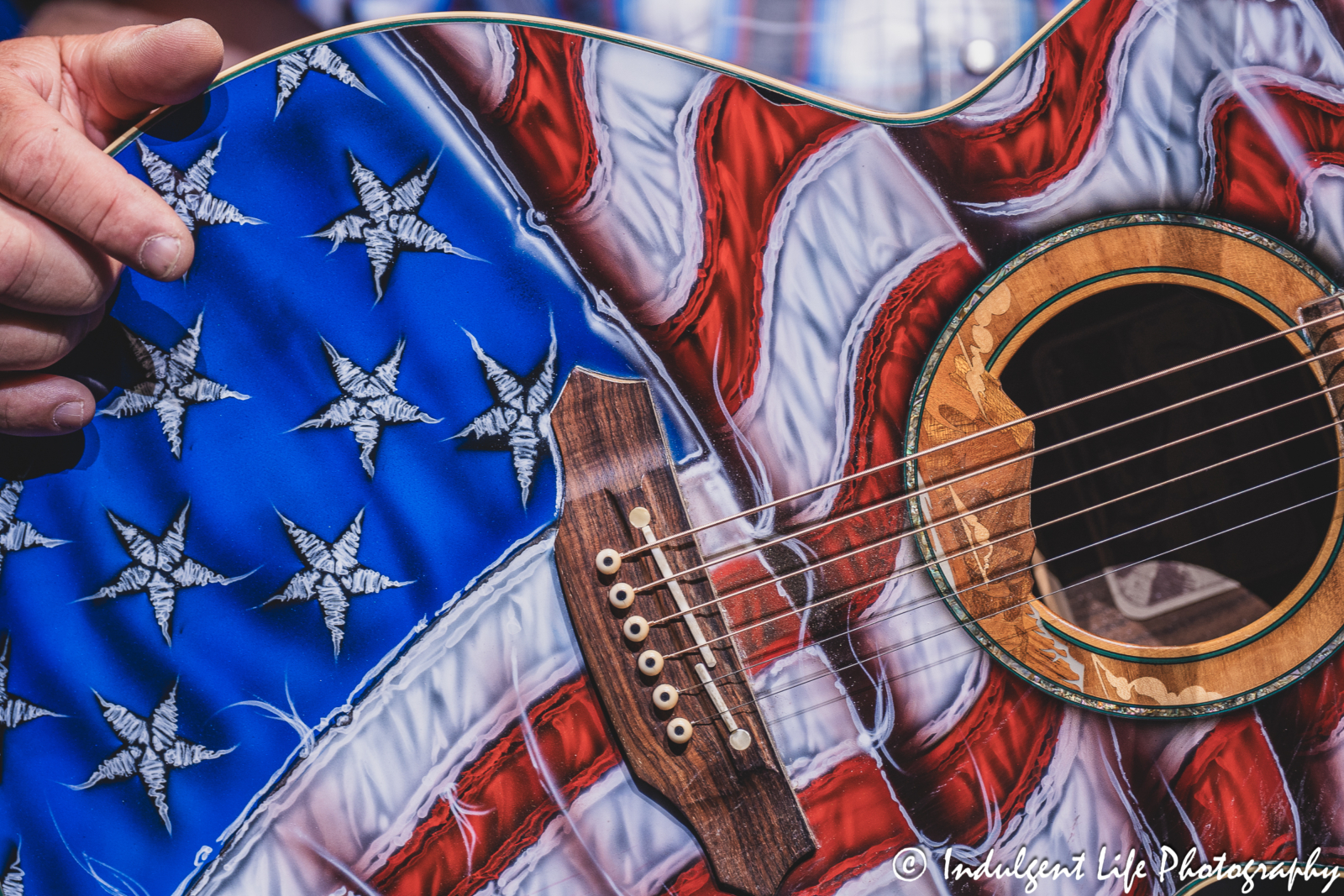 American flag acoustic guitar of John Michael Montgomery as he performed live at Ameristar Casino's Star Pavilion in Kansas City, MO on June 22, 2024.