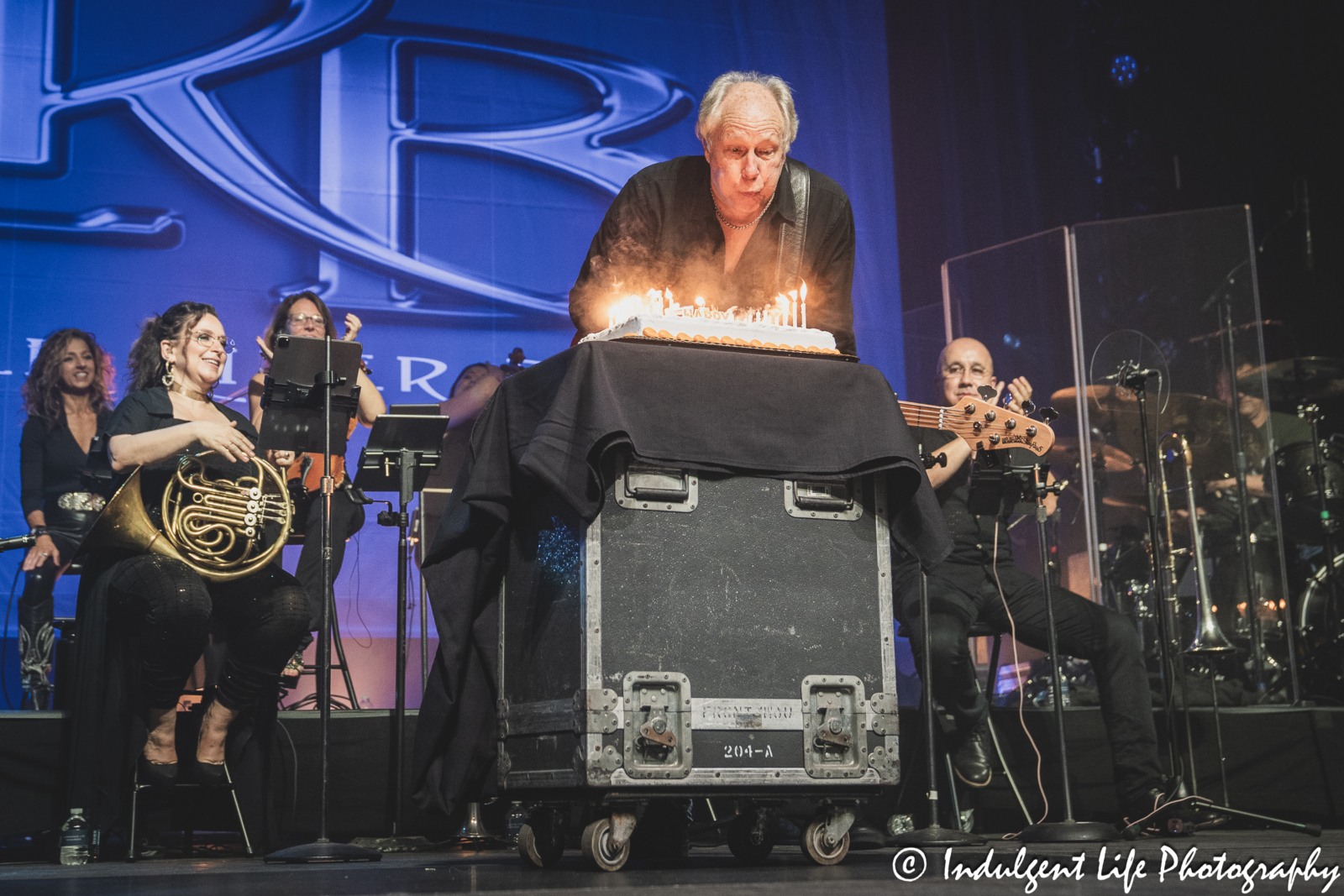 Little River Band frontman Wayne Nelson blowing out the candles on his cake during his birthday celebration at Ameristar Casino in Kansas City. MO on June 1, 2024.