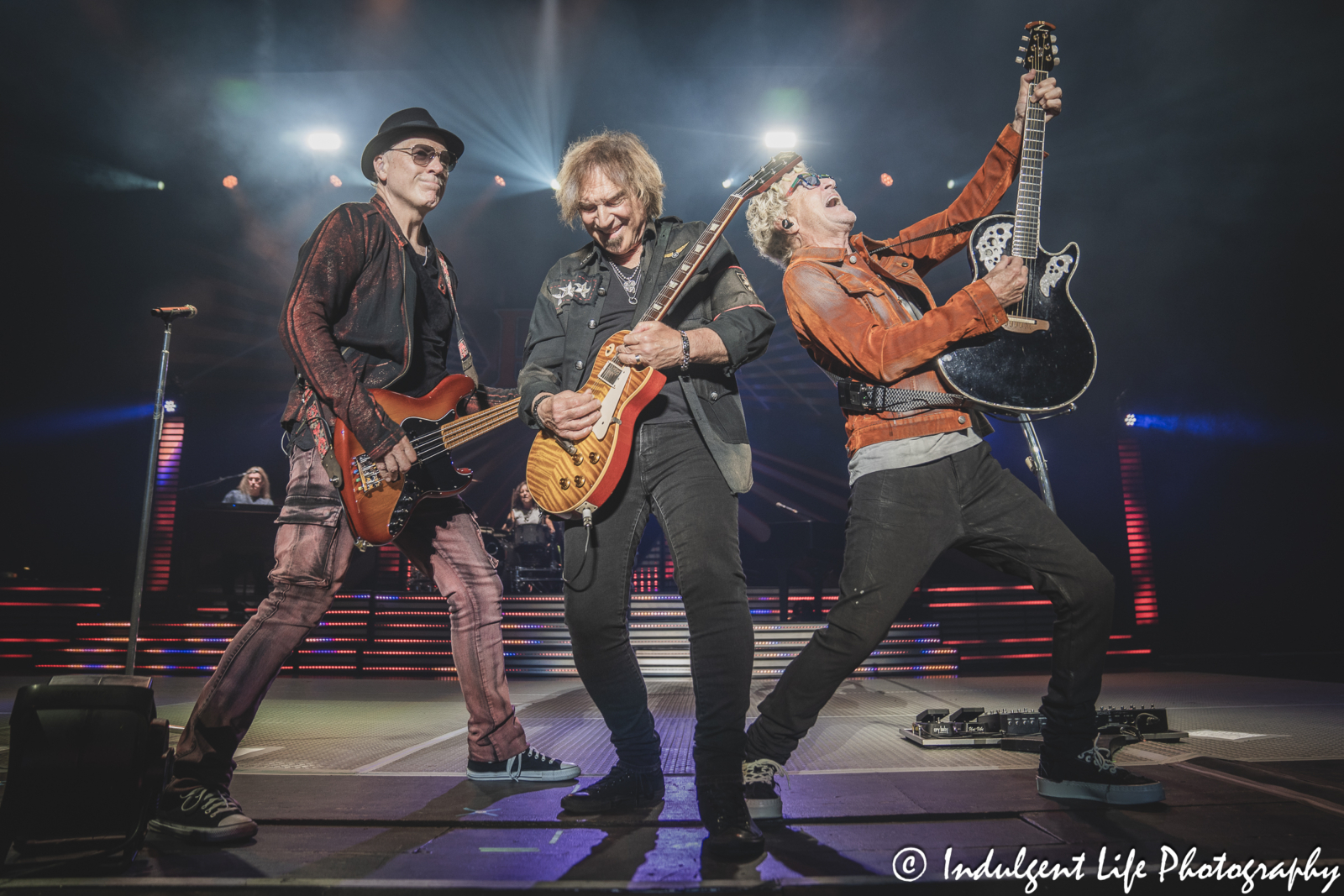 REO Speedwagon guitarist Dave Amato and lead singer Kevin Cronin performing live with bass player Matt Bissonette at Starlight Theatre in Kansas City, MO on June 19, 2024.