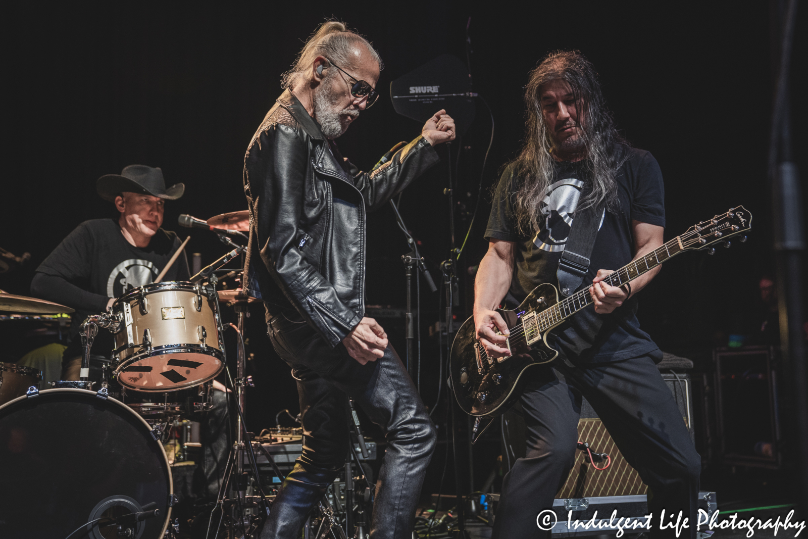 Lead singer Ivan Doroschuk of Men Without Hats performing live with drummer Adrian White and guitarist Sho Murray live at Uptown Theater in Kansas City, MO on July 7, 2024.