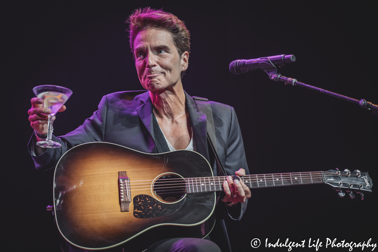 Richard Marx toasting to Rick Springfield during their set together at Ameristar Casino Hotel Kansas City on August 24, 2024.