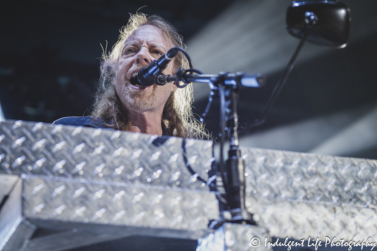 Foreigner band member Jeff Pilson playing the keyboards during "Cold As Ice" at Azura Amphitheater in Bonner Springs, KS on October 5, 2024.