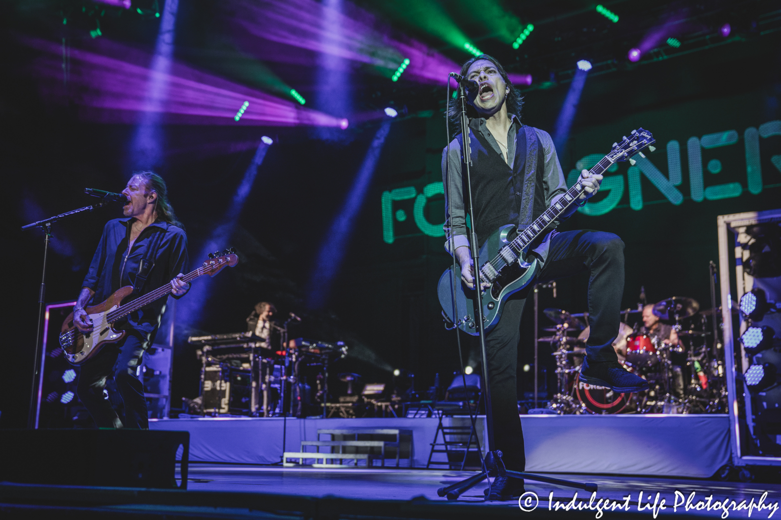 Foreigner bandmates Luis Maldonado and Jeff Pilson performing "Head Games" at Azura Amphitheater in Bonner Springs, KS on October 5, 2024.