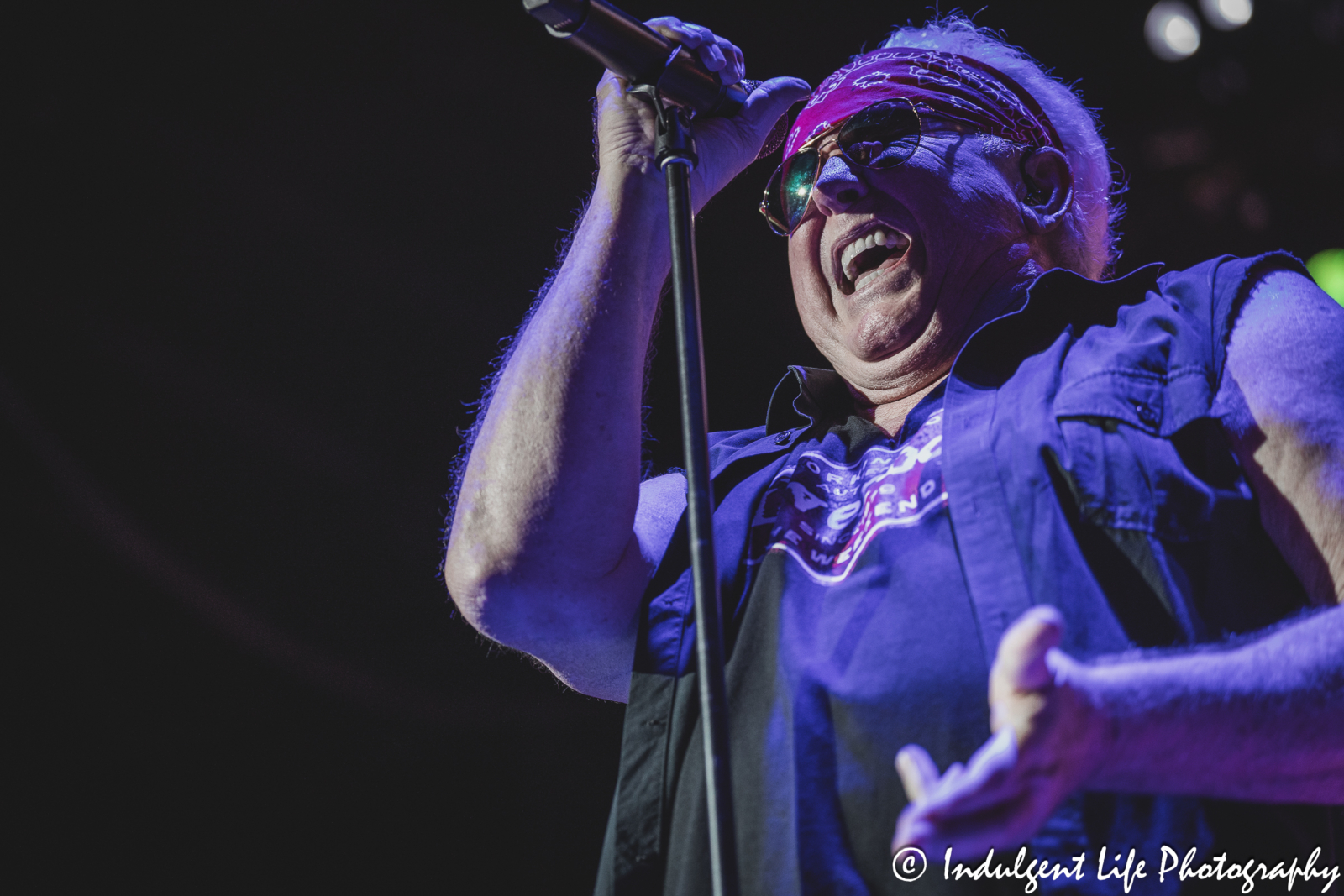 Loverboy frontman Mike Reno singing "Queen of the Broken Hearts" at Azura Amphitheater in Bonner Springs, KS on October 5, 2024.